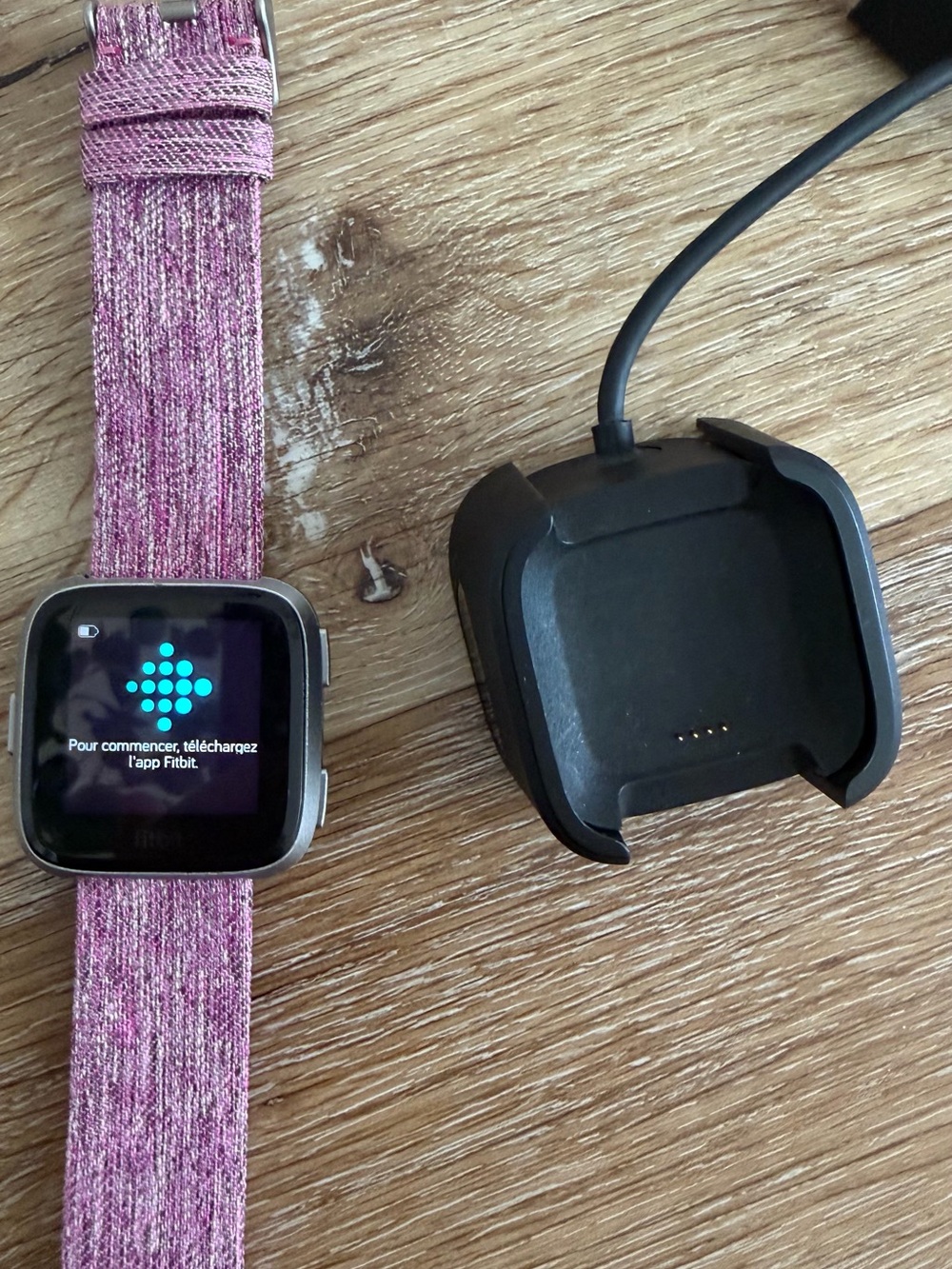 fitbit Versa with Pink Fabric Band and Charging Dock
